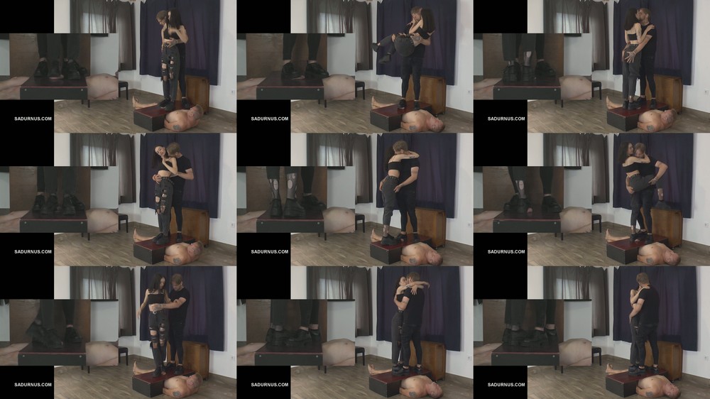 Sadurnus - The Couple Makes Love While Trampling On The Slaves Groin Pp